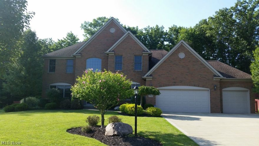 Move In and Enjoy, Desirable Independence Neighborhood. Former Model! Kitchen Boasts Granite Counters, Walk-In Pantry, Island and See Thru Fireplace To Great Room. First Floor Den and Laundry, Formal Dining Room. Three Generously Sized Bedrooms Up. Master With Walk-In Closet & Whirlpool Tub. Finished Lower Level With Full Bath. Attached 3 Car Garage, All Situated On Private Wooded and Fenced Lot. Additional Features Include Backyard Deck, Sprinkler System, Plumbing For Generator, Radon System, Hot  & Cold Water In Garage, Vaulted Ceilings and Arched Doorways.