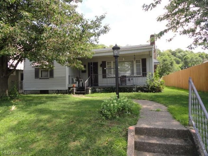 Surprisingly spacious 3 BR ranch home features equipped eat in kitchen + formal DR, L shaped rec.room + huge family room, 3/4 bath/laundry combo in basement, small workshop & tons of storage. Level yard & covered front porch.