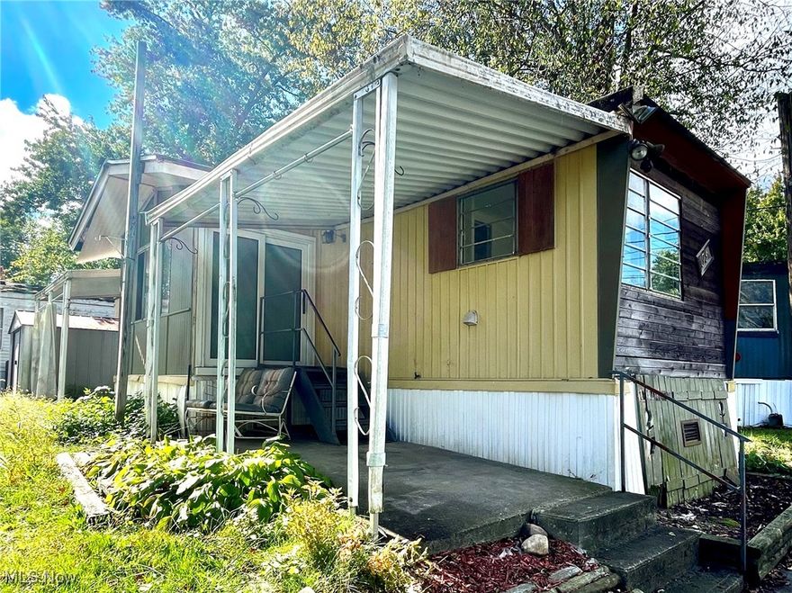 Step inside this spacious Executor mobile home featuring 3 bedrooms and 1 bath. The open great room combines the living room, dining area, and kitchen for a bright, comfortable flow. The kitchen includes a convenient breakfast bar and all appliances stay! Enjoy both front and side porches, plus a handy storage shed. Recent updates include a new furnace (2024), new hot water tank (2025), and new lighting throughout. Located just minutes from Kent State University in the desirable Whispering Pines community, which also offers a kids’ park for outdoor fun. A great deal you won’t want to miss! Park approval required through Horizon Land​​‌​​​​‌​‌​​​‌‌​​​‌‌‌​​‌​​‌‌​​​​ Management.