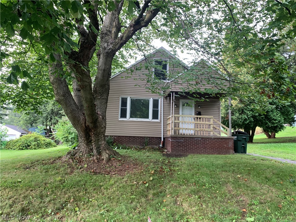 Completely updated-NEW Roof, furnace, floors, kitchen, bath, paint, HWT