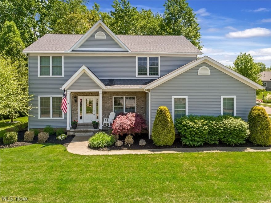 Welcome to this spacious colonial located in desirable Kings Ridge Allotment in Green.  This inviting abode offers three bedrooms all situated on the second level in addition to four full baths.  The laundry room finishes off the second level.  What an amazing floor plan.  Enjoy entertaining in your two story great room with a wall of windows and a fireplace.  This opens up to a nicely sized eat-in kitchen with white cabinetry and stainless appliances.  Don't forget the formal dining room and private office for those working from home.  The lower level is finished and has a rec room in addition to a kitchenette perfect for entertaining.  Enjoy summer BBQs on your patio.  All of this plus a 2 car attached garage.  This home has everything that you are looking for.  Stop looking!  Call to schedule a showing today.