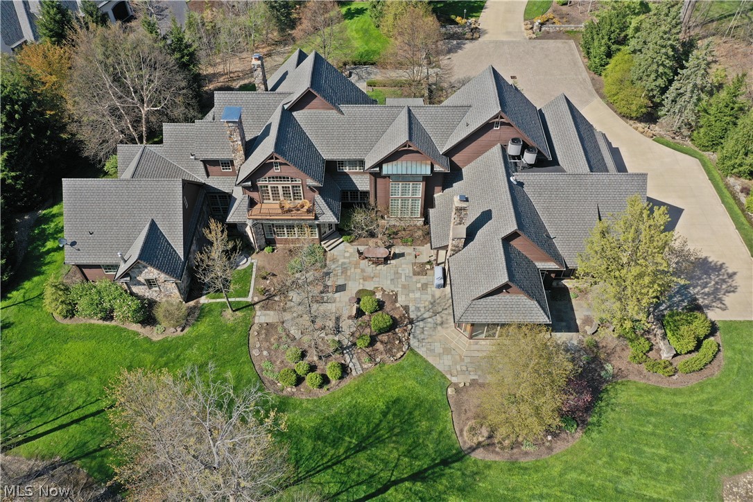 Get ready to fall in love! Magnificent timeless estate sited on over 2 pristine acres. Architecturally rich in exquisite details & craftsmanship—built by Palmieri Builders. Main floor features a formal dining room off the 2-story foyer. Living room is equipped w/a fireplace & floor-to-ceiling windows. Sophisticated library w/wet bar, fireplace, & an elegant, coffered ceiling. Dream kitchen w/hearth room, side office, soaring vaulted ceilings, top-of-the-line appliances, cabinetry, & butler’s pantry. Sun porch overlooking the phenomenal private backyard & bluestone patio acts as an extension to the outdoors. 1st floor master wing features a dressing room, sun porch, his & her private baths & walk-in closets. 2nd floor offers 3 bedrms including a master suite, office/bedrm, & cedar closet. Extraordinary lower level that is an entertainer's dream- equipped w/a billiards rm, full bar w/kit, wine rm, home theater, large gym w/access to the master suite, spacious romantic spa rm w/steam show