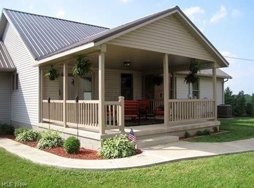 3 bedroom ranch home brick frontage 3 full baths - finished walkout basement - 2 car attached garage - finished 4 car detached garage - 5 acres country living