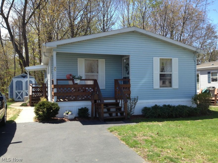 Wow!  This just like new home has beeen meticulously maintained and gives you that warm and fuzzy feeling.  It is a double wide featuring an open floor plan with cathedral ceilings and plenty of storage thruout.  The large kitchen also has lots of cabinets  and counter space too.  A large master bed and bath with his and her closets are among its other features along with central air and a storage shed as well.  The seller ia also offering a quality furnished home if desired and at the right price.  Come and take a look today and make this your home!