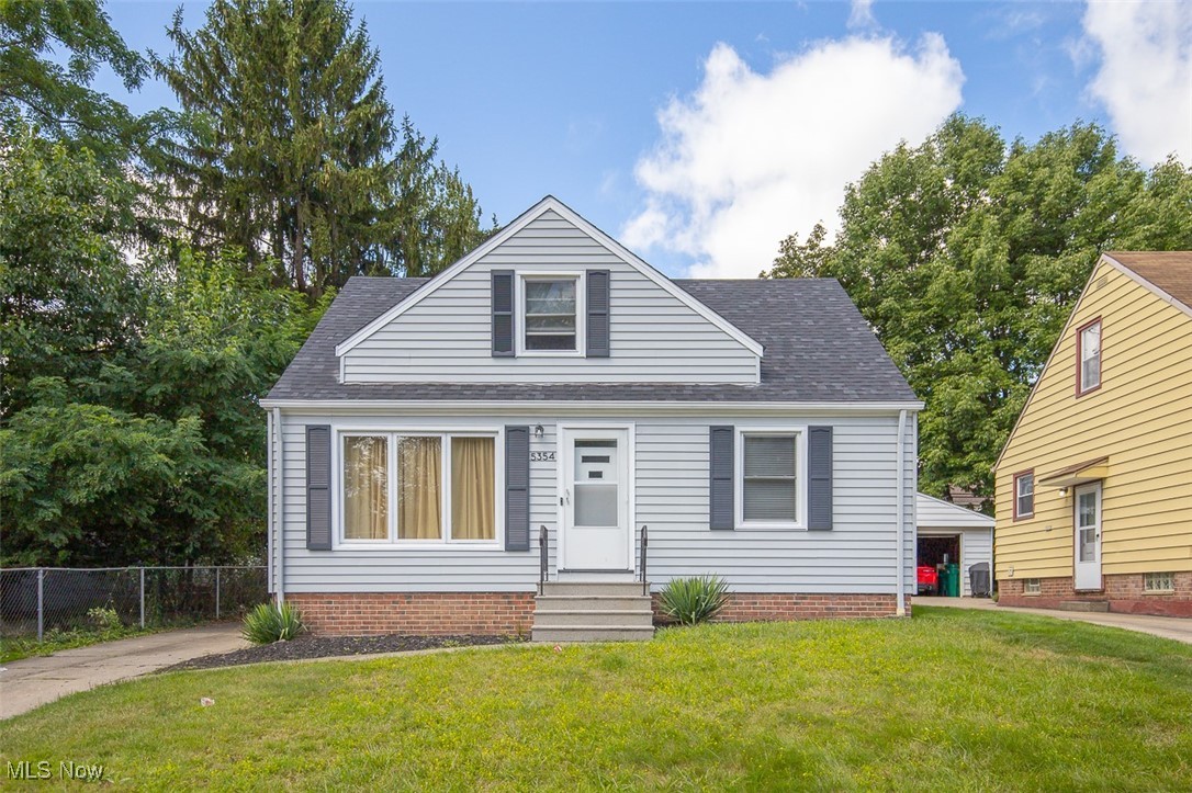 Welcome to this well maintained ,cozy & updated three-bedroom, one-bath Maple Heights Cape Cod. Step inside to find a totally renovated kitchen with new appliances, lighting, cabinets, backsplash countertops flooring and freshly painted. The full bathroom has also been fully updated with style. The main floor offers (2) nice sized bedrooms with new carpet, ceiling fans & freshly painted. A second floor large dormer bedroom is a private owners retreat or nice play area for kids with a large closet & storage. The finished basement has additional living and entertaining space with a large rec room and (2) bonus rooms along with a separate laundry area for convenience. Outside, enjoy a cozy backyard with a covered porch, perfect for relaxing or entertaining.
A one-car garage completes this charming home, offering both comfort and functionality. In addition the home offers a new roof 2025, glass block windows & partially fenced in yard. Don't miss the opportunity to call this home! Schedule your private tour today & make an offer.