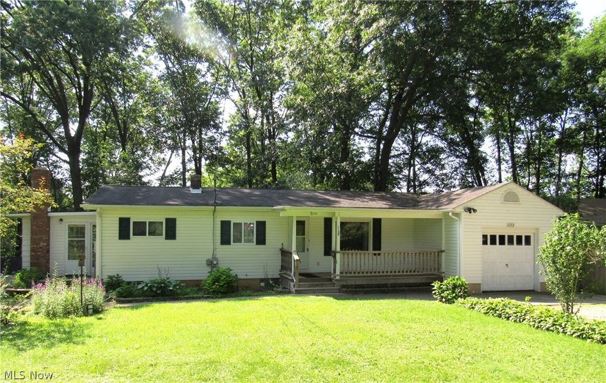 Ranch with walk out lower level on 3 lots-.74 of an acre lot. 2 bedrooms , spacious kitchen plus year round sunroom. Walk out lower level has 2 rec rooms- could be possible 3rd bedroom  ..half bath in lower level. 1 plus car garage attached. Great lot with small outbuilding.