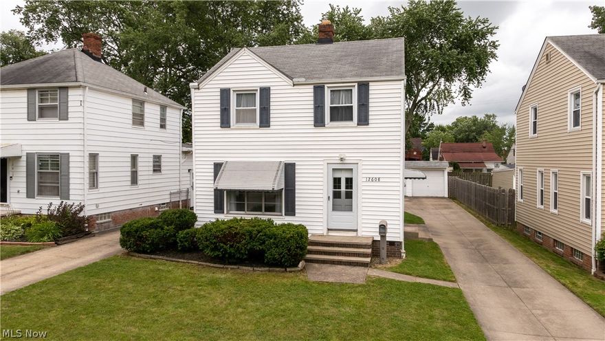 12608 Thraves Ave Garfield Heights is a beautiful Colonial home that will meet all your needs. This 3 Bedroom 1 & a 1/2 bath home has wood grain floors throughout the 1st &2nd floor installed 2018. The bedrooms are all carpeted & have natural light, one bedroom ample sized for a king bed. The light & airy feel of this home & size of the yard are great for entertaining. Kitchen has a great layout  for cooking & opens to the wonderful Dining Room with large window area which then opens to a HUGE Living Room with all kinds of ways to arrange your furniture, even room enough for an office desk area near the stairs. With a bonus room in the basement next to the laundry room & half bath it gives this home the extra room needed for whatever you want! Garage to protect your vehicles and grill in your back yard with plenty of room to entertain! Updated look throughout & includes new furnace in 2018, fresh paint, lovely neighborhood feel, friendly atmosphere, close proximity to both public and p