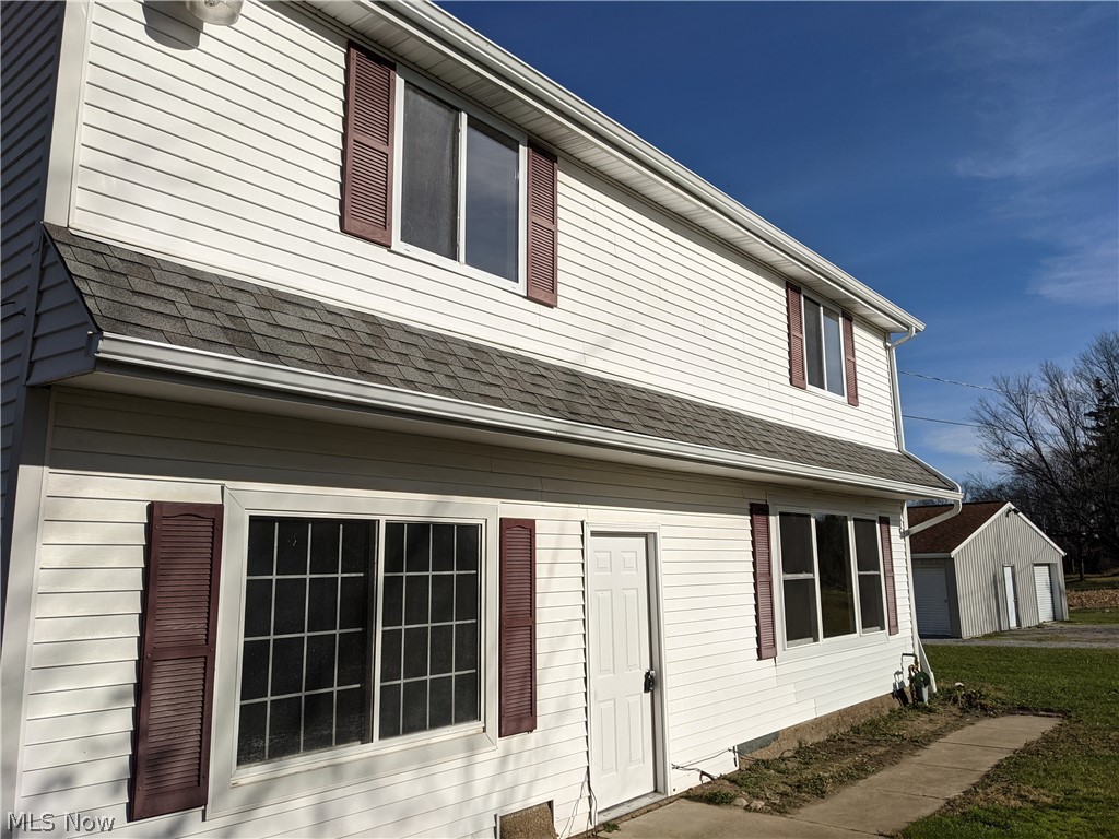 Rare Find...House w/ 50x40 building with 6 bays that could be used as rentals. 5 bays are 18 x 10 and 1 bay is 50 x 18 Electric is run to the building. Updated house offers 4 bedrooms and 2 full baths. Kitchen counters on order and will be finished soon. 4th bedroom could be 1st floor office. Laundry/Mud Rm on 1st floor. Loft would make a great computer room or play room along w TV room...many possibilities!!!! 3 bedrooms up with full bath...spacious bedrooms!!! Updated baths!!! Living Rm off of Eat-In-Kitchen. Concrete patio and walk way have just been added to the side and back of house. Nice value and opportunity. Updated throughout!
