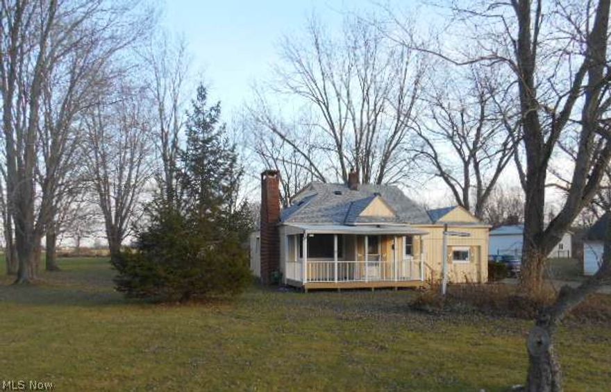 Grafton Bungalow Is Nestled On A .97 Acre Wooded Lot. Living Room Features Brick Fireplace and Some Hardwood Flooring! Front Porch Is Perfect Place To Sit and Enjoy The Country Views! Large Shed Provides Storage Space For Yard Tools and Toys! Enjoy Country Living But Yet Remain Close To The City!