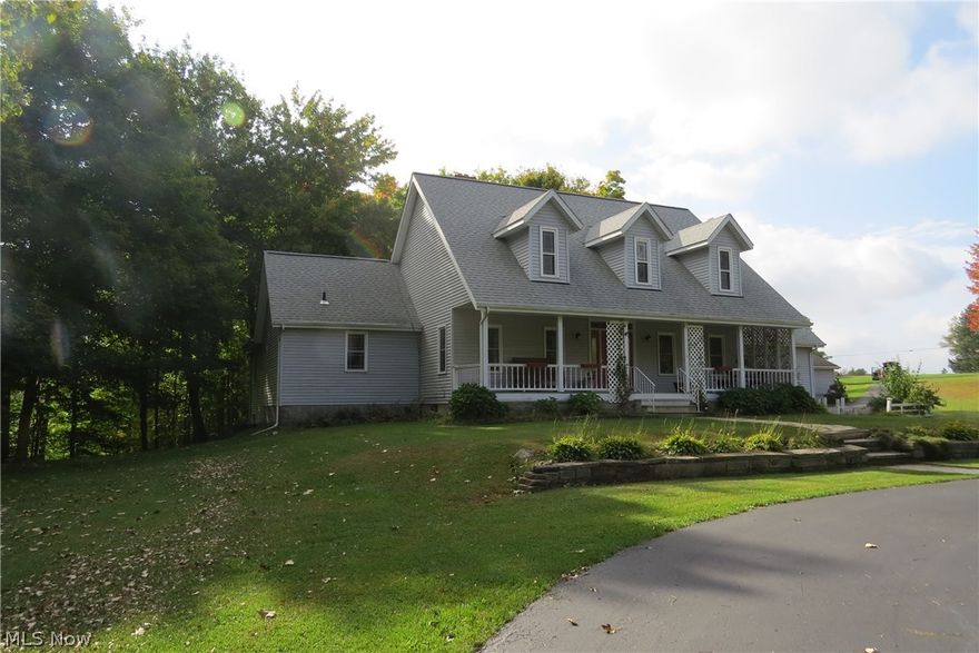 Lovely 5 bedroom country home on 6.20 acres.  Woods and creek, pond with deck.  Secluded, at the end of a long driveway.  Huge Cook's kitchen with loads of cupboard space and a pantry.  Large front porch for those quiet evenings. Fully finished  walk-out basement.  First floor master suite with it's own private deck, walk-in closet and bath.  Bath has a jetted tub and separate shower.  Over-sized attached 2 car garage, plus a detached 2 car garage.
Lower level can be used as a extra living suite or Mother In Law suite.
Also Available:
2720 John deer (2010 model)
54" mower deck
54" snow plow w/hitch
53" front loader
 For additional $18,000