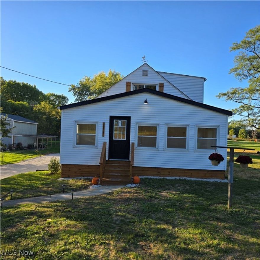 Rustic Living with Modern Convenience…This is a rare opportunity to buy a live-in ready home with lots of land conveniently located near expressway access. This home was completely renovated to include the addition of over 750 sq. ft. (bedroom, bath, and finished basement). This 4 bedroom, 2.5 bath home boasts over 2,000 square feet of living space. It features all new plumbing, electrical and mechanicals, a massive lower level en suite bedroom with a walk-in closet, a four-season room, a recreation room, oversized laundry room, an oversized 2 car garage with a huge, oversized driveway situated on 1.686 acres in historic Tallmadge. The kitchen and baths feature large cabinetry with tiled features and nickel hardware. Lots of natural and LED light throughout. The lower level space walks out to grade level and has 2 means of egress. This home is moderately priced at $142/sq ft for quick sale. Tallmadge City Schools. Convenient to 532 and I76. Seller is a licensed real estate agent.