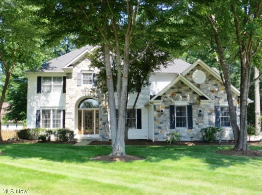 Fabulous one owner home in desirable neighborhood ! Updated kitchen with quartz countertops and stainless steel appliances. Open floor plan with newer hardwood floors in living room, dining room and foyer. First floor den and remodeled half bath.  Two story family room  with raised hearth fireplace complete with gas logs. Side entrance porch into laundry room-washer/dryer stay.  Master suite with updated bath with granite, soaking tub & ceramic shower. Twelve course basement ready to be turned into family recreation area with glass block windows.  Tiered deck off kitchen with 6 person hot tub. Newer roof & newer furnace and air conditioning. Irregular shaped lot offers trees, plenty of room for kids/pets. Close to Metro Park's Kopf Family Reservation. Truly a must see!