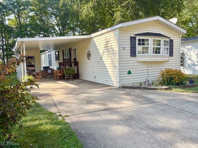 Enjoy Living in this 55+ Adult Community Mobile Home Park located in Columbiana Spacious with many renovations that is Move In NOW.. From the Well Kept inside with Nice Size Kitchen plenty of Cabinets and Counter space to the Open Living room entering down the hall to 2 Nice size Bedrooms and 2 Full size Bathrooms. The Main Bedroom has a Full length closet, Double doors, entering through Double French doors into a Full Bathroom with Large Counter/Sink, Tub/Shower and Storage closet. The other Full Size Bathroom has entry to into the Second Bedroom or Hallway. The Laundry is in Hallway with Cabinets/Rod that holds any size washer/dryer. The Extra Storage throughout Inside has much Storage Outside as well. The 2-Storage Buildings give ample to store more items for our inside/outside needs. The Large Shed has Electric and Shelving already installed. Relax under the Overhang /Carport as a cozy patio or Relax under trees in the back .. a Park-like setting. Lot Rent includes Trash Services. All Buyers must be Approved by Park Management.