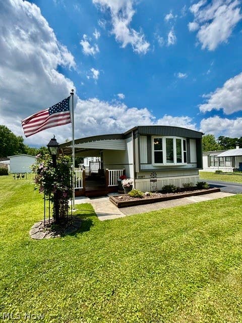 Photo of 62 Manor Drive, Brookfield, OH 44403 (MLS # 5220674)