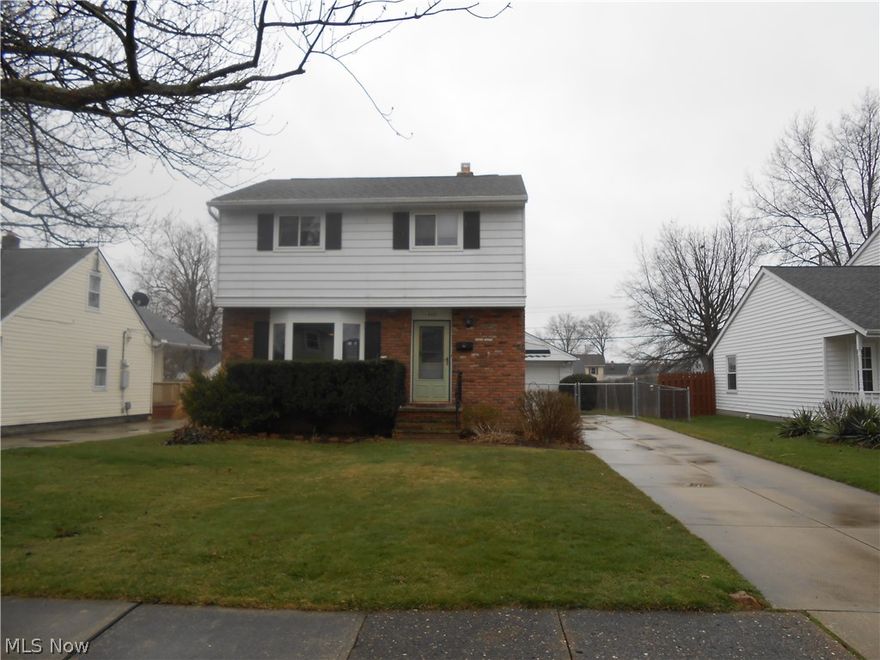 Spacious 3 bedroom, 1 and a half bath Colonial with full finished basement!!  Large Living Room!  New Flooring in Kitchen and Dining Room!  Sliding doors off dining room lead to a beautiful Patio Area!  Great yard for entertaining!  Large Garage with attached enclosed patio!  Backyard is Privacy Fenced with above ground pool and deck!  Nice size 50 x 152 lot!  Large Master Bedroom!  Central Air!  All Appliances Stay!  Refrigerator 1 year old! New Carpet in Basement!  12 Month Home Warranty!  This home is a must to see!!