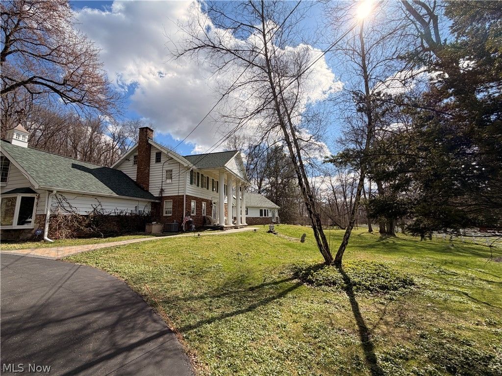 Photo of 535 Crystal Lake Road, Akron, OH 44333 (MLS # 5192742)