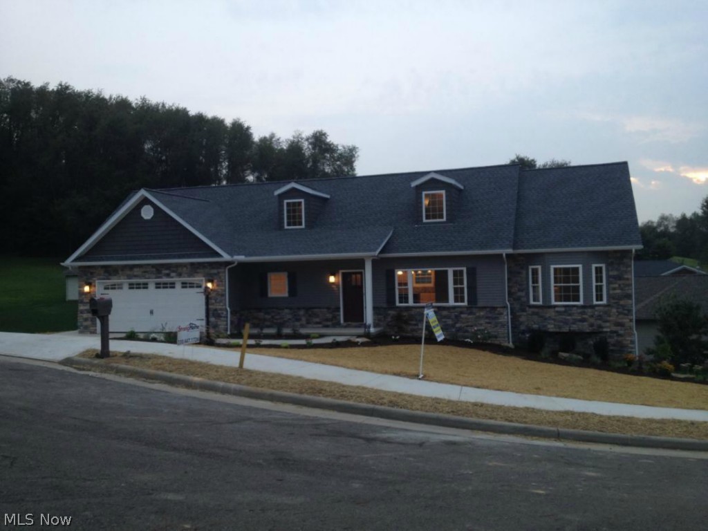 Custom new construction home on 100x120 lot in Goshen Glens development !! Beautifully designed and built. 6 bedrooms with 3 full and 2 half baths. Open floor plan with hand-scrapped bamboo floors on first level. Custom glazed two-tone maple kitchen cabinets with granite countertops. Hand scraped bamboo floors in sun room, dining room, living room, master suite and kitchen. Huge walk in kitchen pantry. Custom master tiled shower. Jen air appliances. Walk out finished basement. Stone and vinyl face. Kitchenette in basement. 1st floor deck and basement patio. This will be 2014 parade of homes! Over 4,200 sq. ft. of finished living area. Must see this beautiful StrongHome Construction custom home.