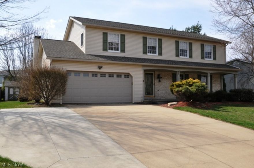 In the market for a great looking 4 bed, 2.5 bath colonial in the Eastgate Commons area of Ellet. This house has a lot of updates, roof and siding replaced in 2009, upstairs bath in 2010 as well as a finished basement in 2009. The kitchen has a new backsplash and counters and all bedrooms have ceiling mounted lights. The basement has all glass block windows. On the outside an additional parking pad in the front and a basketball court in the back. This home is located on a cul-de sac.