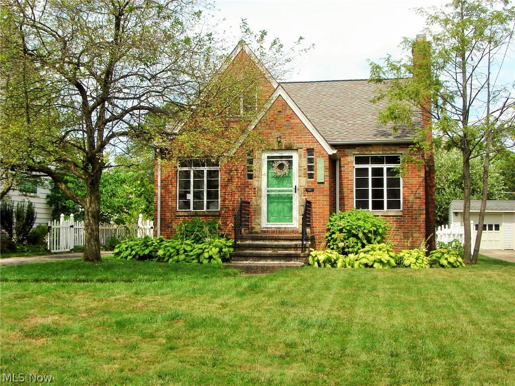 Rocky River gem! Brick 1.5 story with Tudor-style exterior and craftsman touches throughout the interior. Three bedrooms and two full baths. Large walk-in closet in Master Bedroom. Sunny bonus room addition offers many options. ‘50’s style bistro bar and rec room in the lower level. Two-car garage new in 2015, features farmhouse-style sliding side door opening the garage to the adjoining patio, providing an enhanced backyard entertaining area. Kitchen and bath updates done 2017 and 2018. Great location - Linden Park is just steps away on this low-traffic, dead-end street.