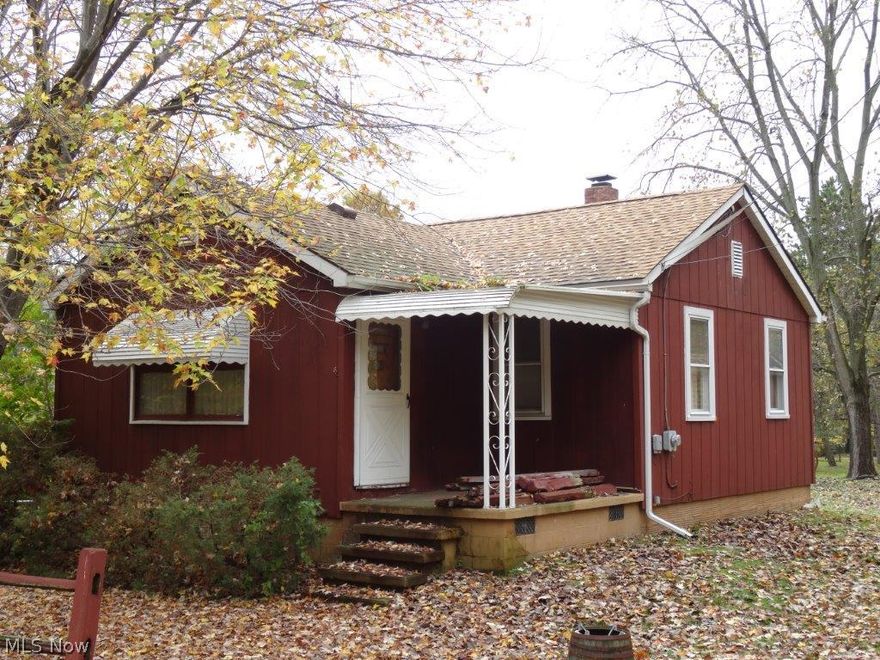 Large lot and huge garage accent this cute bungalow in Springfield township. 3BR, 1BA, full basement.  Spacious acre features a gazebo, huge detached garage, fire pit and storage shed.  Newer roof.  House needs updating and repairs - sold as-is!