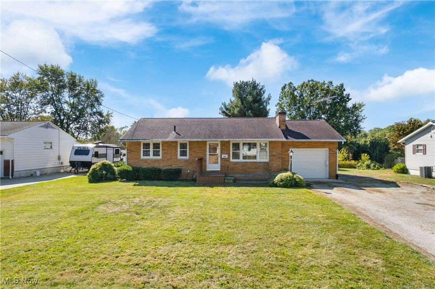 Welcome home to this charming 3 bedroom, 1 bath ranch, perfectly situated on a generous .31-acre lot in the heart of Barberton. Built in 1961, this home offers a little over 1,500 square feet of living space, including a partially finished basement for added flexibility. Step inside to find a bright and inviting living room with a cozy fireplace, perfect for gathering with friends and family. The adjacent dining room and spacious kitchen provide plenty of room for everyday living and entertaining. A sun-filled four-season room with large windows expands the living space and overlooks the backyard. The home offers three main level bedrooms plus a full bath. Downstairs, the partially finished basement features 2 additional recreation rooms, a second fireplace, a workshop and additional storage space. Enjoy the outdoors in the large yard where there is room to garden or play and a storage shed to store your mower or other outdoor equipment. An attached 1-car garage and wide driveway add convenience. With a little updating, this property is ready to shine and offers great potential for its next owner. Conveniently located near parks, schools, and shopping with easy access to major routes.