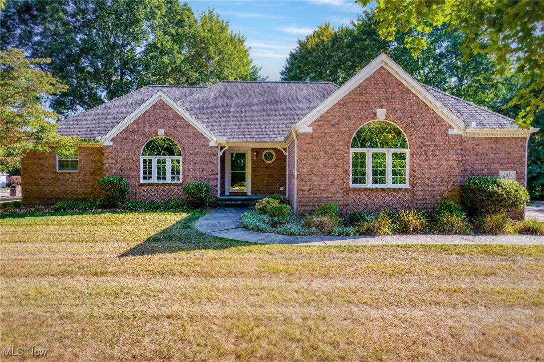 Timeless charm meets comfort in this 3-bedroom, 2-bath single-family home, boasting 2,200 sq ft of well-appointed living space. This custom built ranch home with classic brick exterior is nestled on a beautiful lot in the highly desirable Pearce Circle neighborhood, and offers a great blend of indoor and outdoor appeal. Step inside to find a spacious layout filled with natural light. A comfortable living area perfect for gatherings flows into a well-equipped kitchen ready for home-cooked meals, as well as a sizable dining area. Enjoy the peace and quiet in the sunroom where you can read, bird watch, or just relax. The private, primary suite with master bath, provides a peaceful retreat, while two additional bedrooms offer flexibility for family, guests, or a home office. A main floor laundry room, 2 car garage, and huge unfinished basement are just some of the extra conveniences you’ll find waiting for you. This home gives the best of both worlds: A serene setting with easy access to schools, shopping, dining, and more. With its spacious layout, solid construction, and beautiful location, 2107 Pearce Circle offers everything you need to make this your new home — schedule your private showing today!