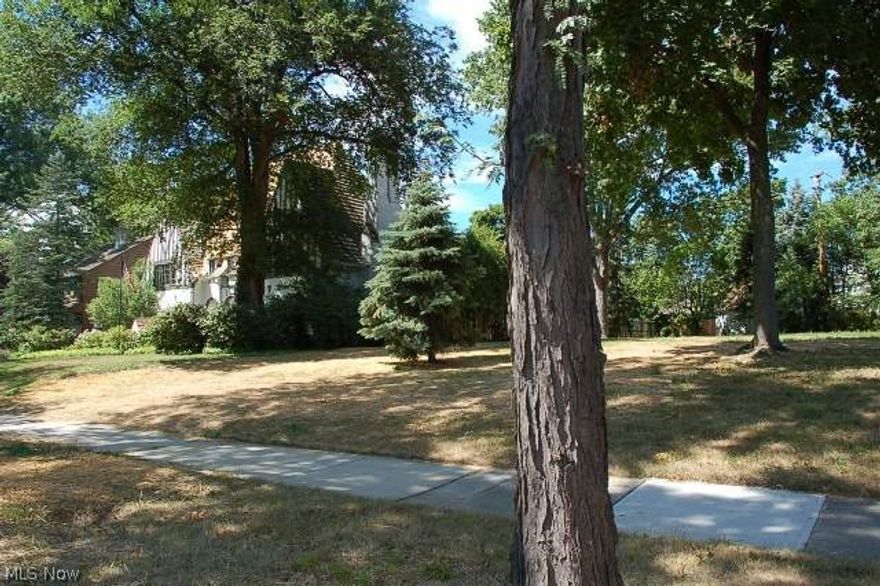 Lovey improved lot in a desirable area of Shaker Heights! Build your dream home here and enjoy all the benefits of convenient location, historic charm and Shaker restaurants and shopping. Taxes are based on land with a home, home has been demolished.