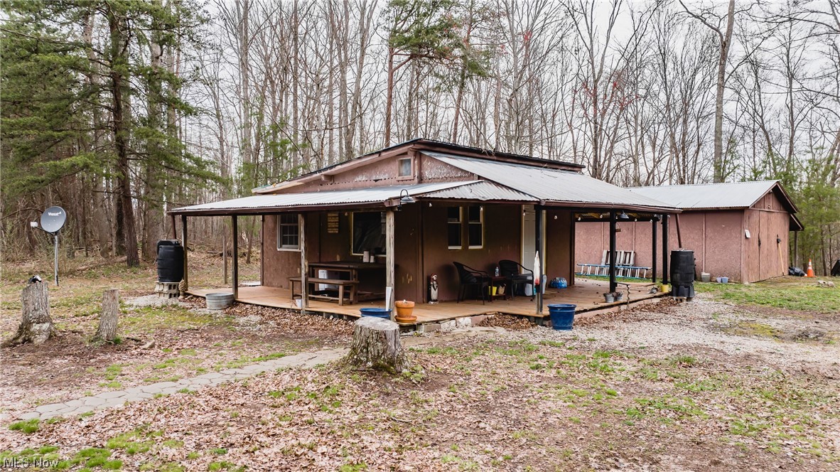 Feeling "Farm-sy"? I have got the place for you! Almost 64 acres of wooded paradise!! At the top of the mountain your cabin awaits...it is a quaint open floor concept with new gas wall heater, new windows, flooring, new electric and plenty of outdoor space to fulfill your wildest dreams! There is currently no indoor plumbing or public water, but those are both achievable! The home features a rain water catching system for water use and has satellite internet and cable. There is also a garage that measures 23x19 and a unstocked pond on the property. If you are ready to own your own piece of Wild West Virginia, schedule your showing today. TIMBER RIGHTS DO CONVEY! THIS IS NOT A DRIVE BY, MUST BE ACCOMPANIED BY A LICENSED REALTOR.