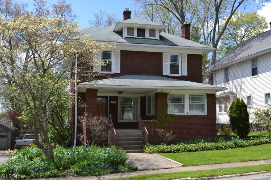 This wonderful brick home offers 4 bedrooms, 1.5 baths and over 2500 sq. ft. of living space. Only one block from COW this home features vintage character and charm.  The welcoming living room has a wood burning fireplace with tons of built-ins and refinished hardwood floors.  Off the living room is a bright sunroom perfect for reading.  The dining room has beautiful woodwork and a window seat with storage drawers.  Off the huge remodeled kitchen is a spacious breakfast room and cute half bath. The first floor family room has more built-ins and wood burning stove.  The large laundry & utility room complete the first floor.  A 2nd staircase leads upstairs from the kitchen to 4 large bedrooms and a remodeled full bath.  The hallway also has handy built-in storage.  For additional outdoor enjoyment there is a 10x25 screened-in porch and the 2-car attached garage makes for easy living.  Recent updates include: remodeled kitchen 2004, remodeled baths 2007, new windows on 2nd floor 2009, hot