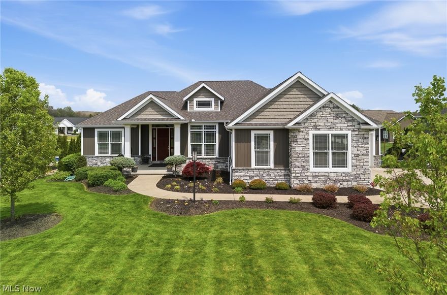 Kauth Custom Homes model home that has never been lived in. First time offered show stopper that is truly a rare find. This ranch-style home showcases exceptional craftsmanship and every amenity you could imagine, featuring soaring 9–10 ft ceilings, zoned heating throughout, and high-end custom finishes. The thoughtfully designed split-bedroom floor plan offers a private and luxurious owner’s suite, while the open, spacious layout is filled with natural light. A beautiful enclosed 3-season room with a stone fireplace provides the perfect space to enjoy your morning coffee or unwind in the evenings. The main level offers approximately 2,455 sq ft, including a large first-floor laundry room, 3 bedrooms, and 3.5 bathrooms. The finished lower level adds an additional 1,333 sq ft with daylight windows, a beautifully finished recreation space featuring a media/theater area, full bathroom, and ample storage. Car enthusiasts and hobbyists will appreciate the attached 3.5-car garage, including a 2.5-car section that is heated and cooled for year-round comfort. This home offers maintenance-free living with quality details throughout. If you’re looking for a home that truly has it all—this is it.