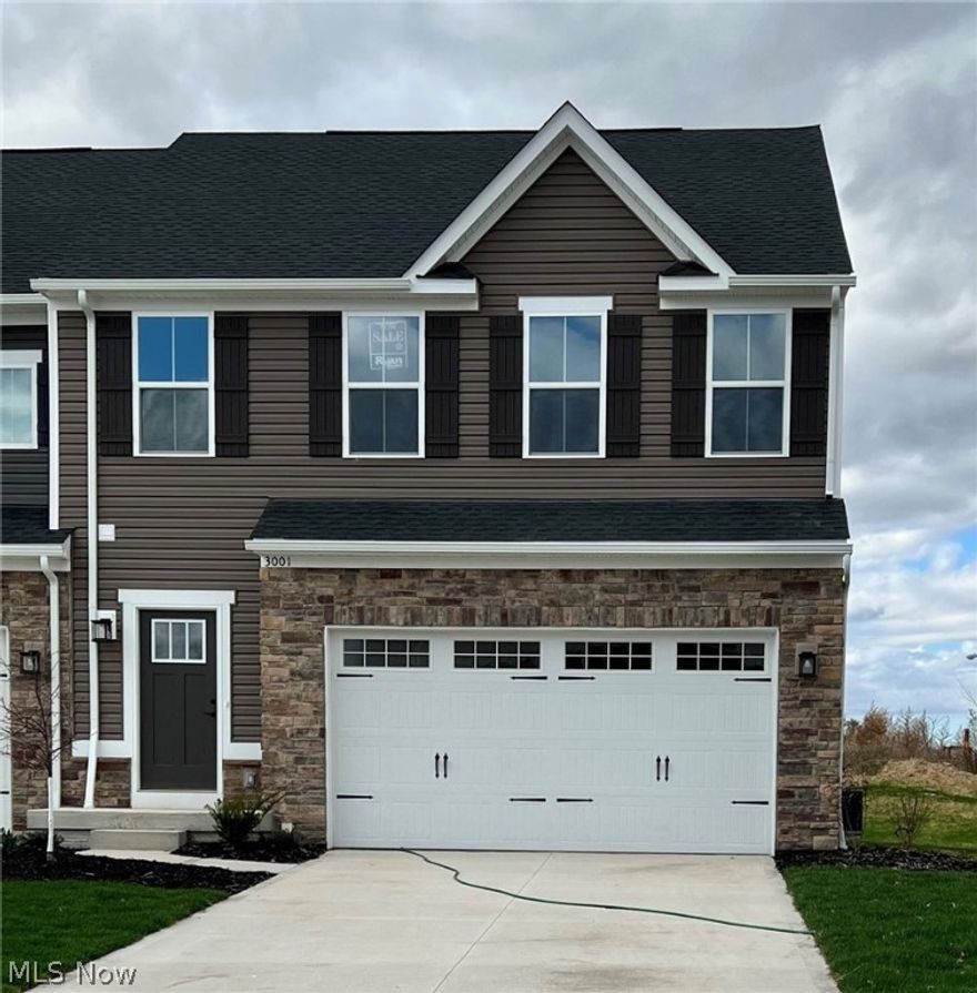 QUICK MOVE IN! This beautiful NEW Rosecliff end unit townhome sits in charming Canal Fulton. You will have plenty of free time to enjoy all the area has to offer with grounds maintenance & snow removal done for you. The stone-accented cottage-style exterior offers an impressive welcome. The open-concept living makes entertaining a breeze with a large island at the heart of the first floor. No more missing out on the fun while hosting! Designer finishes include stainless appliances, luxury 42” white cabinets, popular LVP and an upgraded 2-foot extension with a country kitchen. Upstairs the owner’s suite includes 2 huge walk-in closets & en-suite bath with double vanity. Convenient 2nd-floor laundry with 2 additional beds & full bath round out the upper level. Full basement and a 3-piece rough-in to easily finish and add a bathroom if you want later! 10 yr. warranty included. Interior photos for representation only.