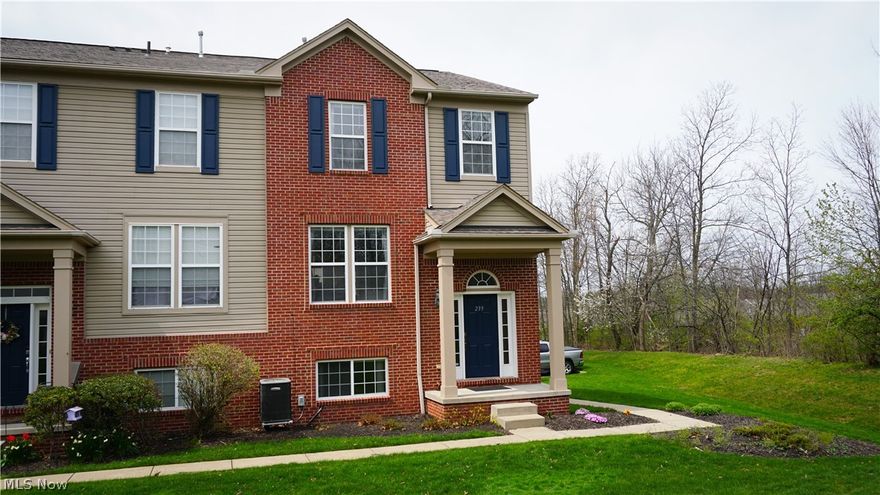 Welcome to 239 Woodhaven Dr in Copley. Enjoy the 3-bedrooms, 2.5-bathrooms this end unit townhome offers. Step inside the 2-story foyer and be greeted by a main level with a living room and dining area separated by a cozy 2-sided fireplace. The wonderful kitchen features a center island and access to a covered balcony that's ideal for enjoying your morning coffee or evening relaxation.  The guest bath and laundry room are adjacent to the kitchen. Upstairs the spacious primary suite offers a walk-in closet and ensuite bathroom. Two additional bedrooms and a second full bath complete the upper level. The finished lower level provides extra living space and a double closet for even more storage along with access to the attached 2 car garage. This end unit offers ample space for play and entertaining. All this and being located just minutes from all the Montrose/Fairlawn dining & shopping and convenient freeway access makes this the perfect place to call HOME!