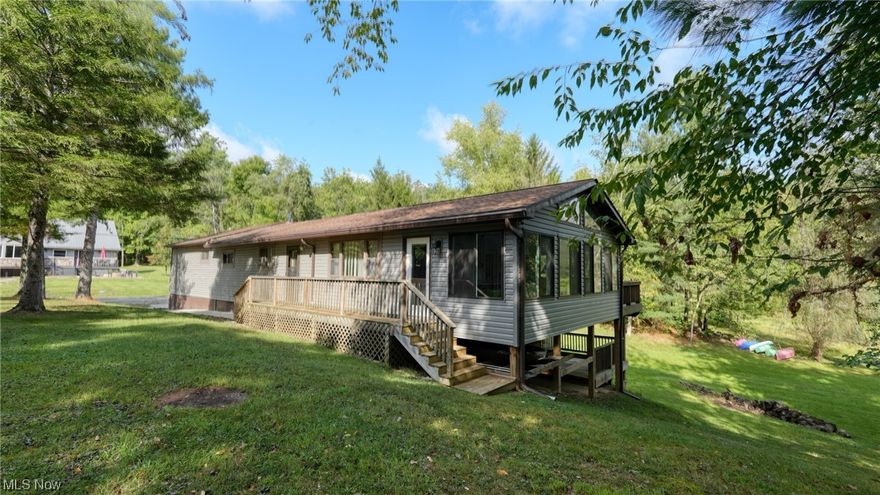 Wonderful Seneca Lake home with 5 bedrooms and 2 full baths on the main floor; an open concept living/dining/kitchen; and a very nice sunroom with lots of windows to enjoy the view. Downstairs has a two car garage; family room with plenty or space for additional beds; and a 3rd full bath. Enjoy the lake from your private dock. This home offers plenty of space for you to invite your friends and extended family to come enjoy the lake with you. This property is within the Muskingum Watershed Conservancy District, so the land is leased and the home and all improvements are owned.