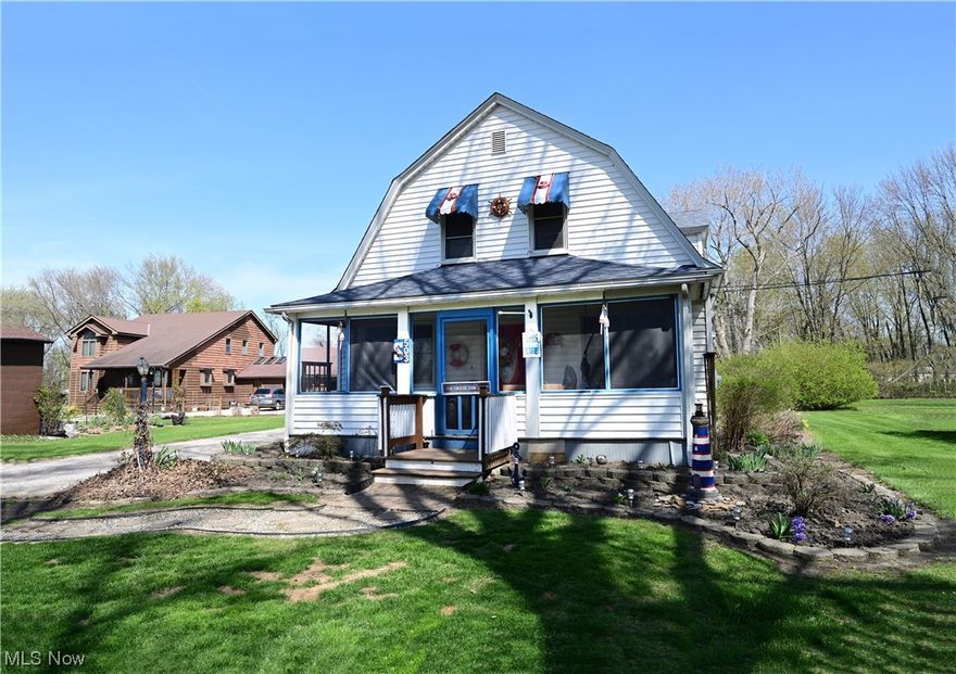 Great opportunity to be living within minutes of Lake Erie.   Check out the charm of this century home. Porches all around- front, side and back.  Beautiful hardwood floors in the large living room and the stairway will wow you as soon as you walk through the front door. This home has four bedrooms (first floor primary suite) and 2 full baths.  The master suite may also be used as an in-law suite with a separate entrance.  Very large kitchen and a dining room with glass double doors.   Second floor has three additional bedrooms and an updated full bath.  First floor laundry and lots of storage. Priced to sell, being sold as is.