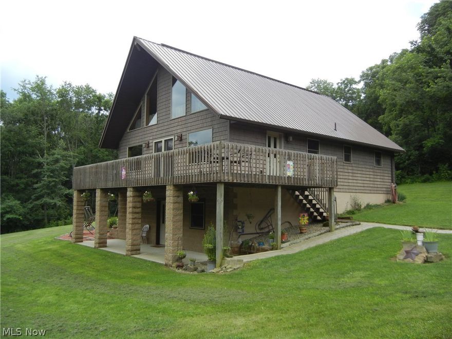 111 Acres of your own mostly wooded personal paradise! A-frame style home back off the road with lots of natural wood surfaces inside. Large open loft could be third bedroom. Woodburner and half bath in walkout lower level. Economical geothermal heating/cooling. Large composite deck overlooking the woods. 30x48 detached 3 bay garage with woodburner and lots of extra space. Extra storage barn and woodshed. Large stocked pond with numerous varieties of fish and turtles. Wildlife galore in one of the top whitetail deer counties in Ohio. Shooting range area and pathways through the woods. All mineral rights transfer.