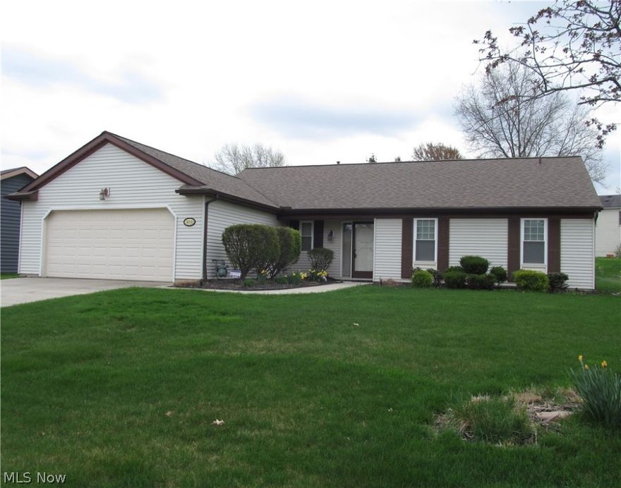 Be first or be sorry! Turn the key and move in! Three bedroom, two bath, super neat & clean Ranch in move in condition. Updated kitchen with granite countertops, high quality Kraftmaid self closing oak cabinets, tile flooring and under counter lighting with dimmers. Range in kitchen has 220 line and gas line. Formal dining room with slider leading to a deck and brick paver patio. Living room has a brick wood burning fireplace. Owner bedroom has full bath with makeup vanity and three mirror wide closet doors. Updated main bath. Two car attached garage with 220 line and tons of outlets. Nicely landscaped yard. Association has nice playground, clubhouse and pool. Carpeting in owner bedroom, hallway and family room updated 2018. Hot water tank replaced 2012. Roof, gutters & downspouts and extra wide driveway replaced 2010. Furnace and central air replaced 2009. Windows replaced 2008.Garage door 2007. Easy to show! Immediate possession! Includes 1 Year HMS Home Warranty!