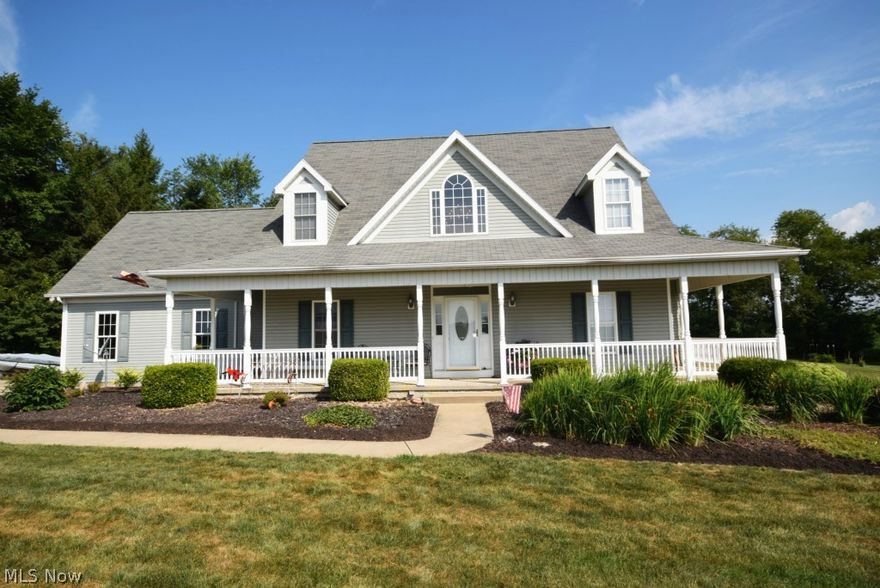 Beautiful country home with great curb appeal and first floor living! Step into open 2 story foyer hardwood floors ~ 4BR, 3.5BA, 4 car garage & 2 full kitchens. Tons of natural light. Great room with dramatic 2 story vaulted ceiling with wood-burning fireplace & open catwalk above. Custom Amish oak cabinetry and new stainless steel Samsung appliances in Aug. 2014 makes the dream kitchen. 1st floor spacious master suite has deck access with french doors, large walk in closet, spacious bath featuring jet tub, double sinks & separate shower. First floor laundry available. Basement has beautiful finish with full BA & kitchen. Tons of storage! 4 car garage-2 attached & 2 detached plus large storage shed. Large trex deck w/much landscaping. Surround sound, heat pump for energy savings. New water heater in 2013. 2008-New Reverse Osmosis Softener & Iron filter added to softener in 2013. Sq footage does not reflect 805SF additional finished living space in the lower level. Upstairs bedroom has