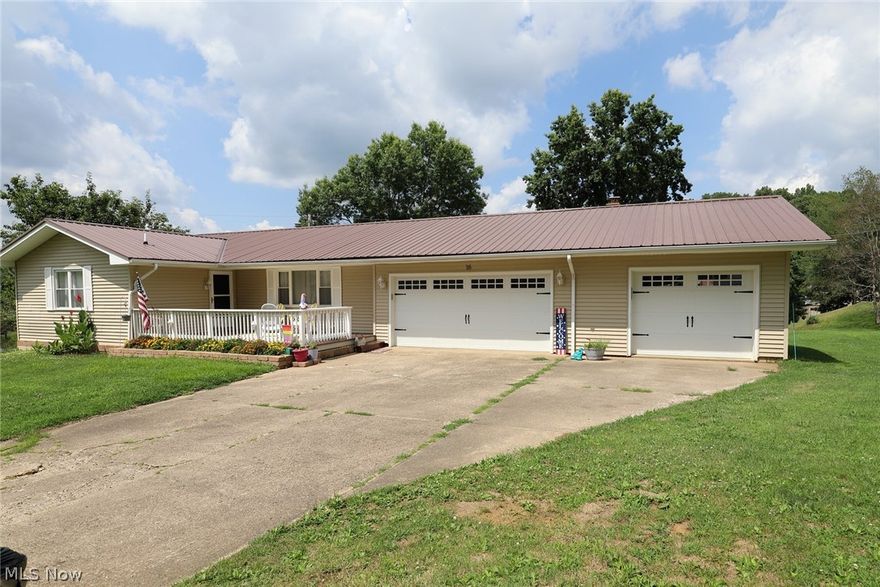Big Value in this beautiful ranch located just outside of town in Coventry Estates. Pet approved with underground dog fence. Enjoy the mornings and evenings with your choice of front or rear decks. Kitchen is ready to go with updated cabinets & granite counter tops. Room for everyone with this 3 bedroom, possible 4th in the basement. Special feature includes the artistry of the custom wall design that is pretty fabulous in pink! Don't overlook the large primary suite. Finished basement is open to your imagination: media room, recreation area, or room to let the little ones run. Made more convenient with a lower level half bath. Has updated windows and an added feature you won't see but will appreciate year round when looking at your utility bills is the large amount of attic insulation. The metal roof was new in 2019 and has new garage doors in 2022. Furnace is 4 years old.