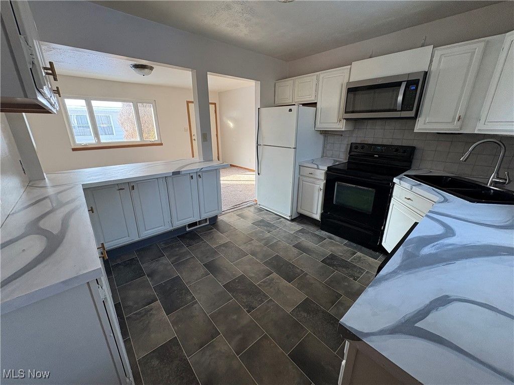 Photo of 1321 Sparhawk Avenue, Akron, OH 44305 (MLS # 5180182)