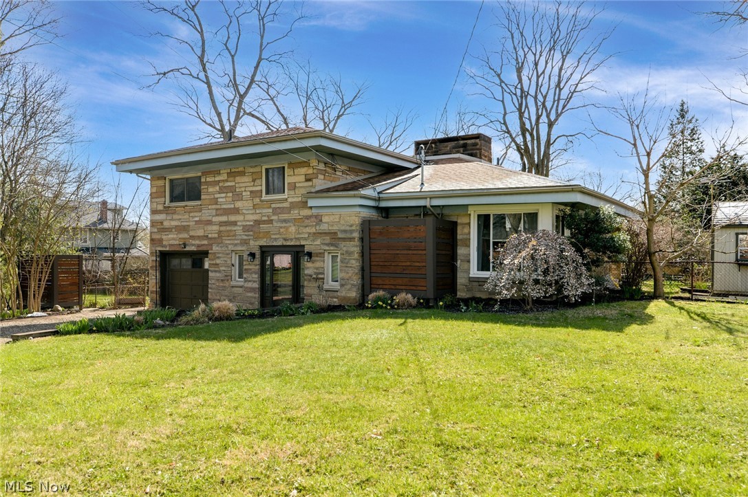 Beautiful Custom Built home in the heart of Cuyahoga Falls. This one off split level home has a rare, private, wooded double lot. The home also features an attached 1 car garage, a walk out basement and fully fenced in yard. This first floor flows well in the manor in which it is arranged. The walk out lower level walks you out to a private back patio. The yard is so private and spacious. The Shed stays with the home. The green house also stays with the home. With 3 Bedrooms/1.5 baths on a double lot. You wont want to miss viewing this beautiful opportunity. Call today for a private showing.