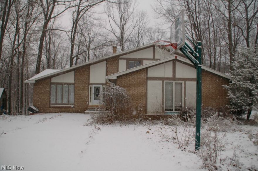 You will be falling over yourself to purchase this property overlooking a ravine. This contemporary home features modern style with 5 bedrooms, 3 and a half baths, and 2 fireplaces. Don't miss out on this great opportunity to make this large home your own located on private cul-de-sac street. 3 full finished levels. Lower level has walk-out. 2 car attached garage. Call today you will fall for this home with a view! In need of some repairs.  All repairs, and any required POS inspections are the responsibility of the Buyer. "SOLD AS IS, and WHERE IS".