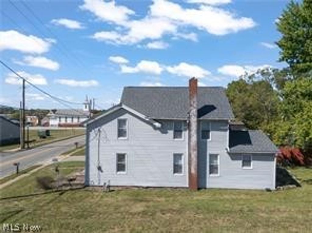 Photo of 223 E Maple Street E, Hartville, OH 44632 (MLS # 5191378)