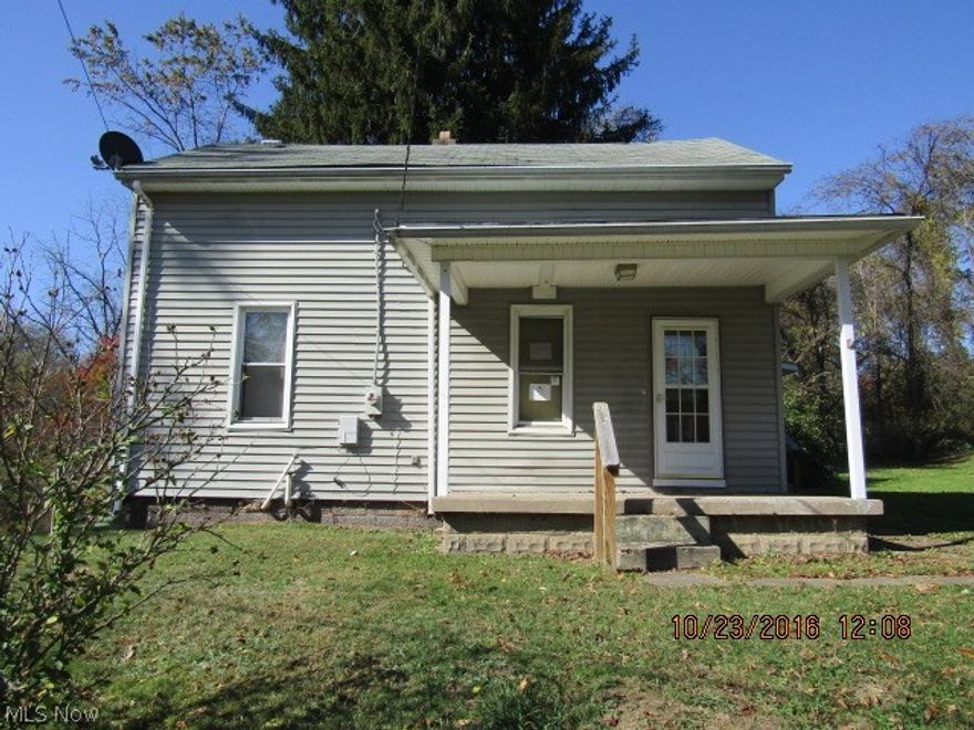 1.5 story home located out of town with just over a half acre of land. Home features a kitchen, living room, 3 bedrooms and 1 bath.