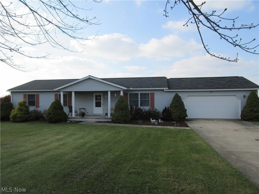 Great ranch in a beautiful setting! Very nice UniBuilt Modular, 3 bedroom, 2 bathroom home on over 2 acres.  Additional features include; a 12-course unfinished basement, an open kitchen and dining room, separate laundry/mudroom, drywall throughout the main level, a sunroom with plexiglass windows, a  2 car attached garage, fenced in area for pets, new roof (2011),  and all appliances stay.  Call today for a private showing!