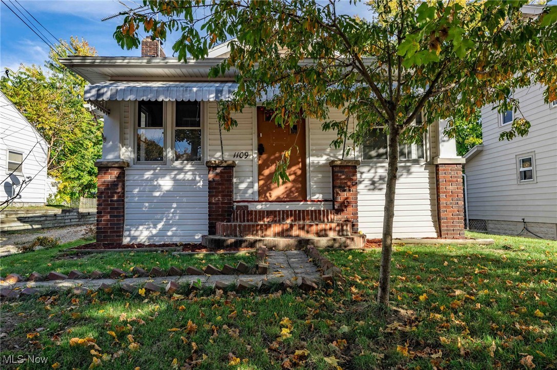 Welcome to 1109 Mt Vernon Ave in Akron! This charming, move-in-ready ranch offers 3 bedrooms and 2 full bathrooms, complete with hardwood flooring throughout. Enjoy the additional living space provided by the enclosed porch and deck, while the vinyl siding and fenced yard offer both comfort and privacy. The spacious 2.5-car garage, nearly 600 sq ft with pull-down storage above, is ideal for hobbies, extra storage, or working on vehicles. The main level features 2 bedrooms and a full bath, with an additional bedroom and full bath on the lower level. Conveniently located near shopping, dining, entertainment, and Route 8, this home is ready for you to settle in!