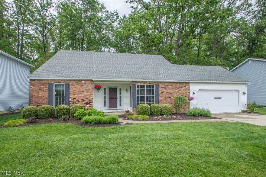 This home is a must see for anyone wanting to live in Olmsted Township. Freshly Painted on the inside. New Carpet in most of the rooms. This 4 bed 2 full bath Cape Cod style home offers plenty of space to entertain. Vaulted ceilings in the family room give a warm welcoming feel upon entry as does the space off the eat-in kitchen complete with wood-burning fireplace that overlooks the treed backyard. The four bedrooms are split, two up stairs and two down with plenty of closet space (two are walk-in) for storage.  Upstairs loft outside of the Master bedroom adds charm and a uniqueness not found in most homes. Finished basement is great for kids or to set up a dry bar or movie area and also offers additional storage/laundry room. Backyard is open and calls for various summertime games, yet trees surrounding lot provide some seclusion from the neighbors. Fire pit in the backyard is ready for roasting hot dogs or marshmallows. Schedule your private showing today!