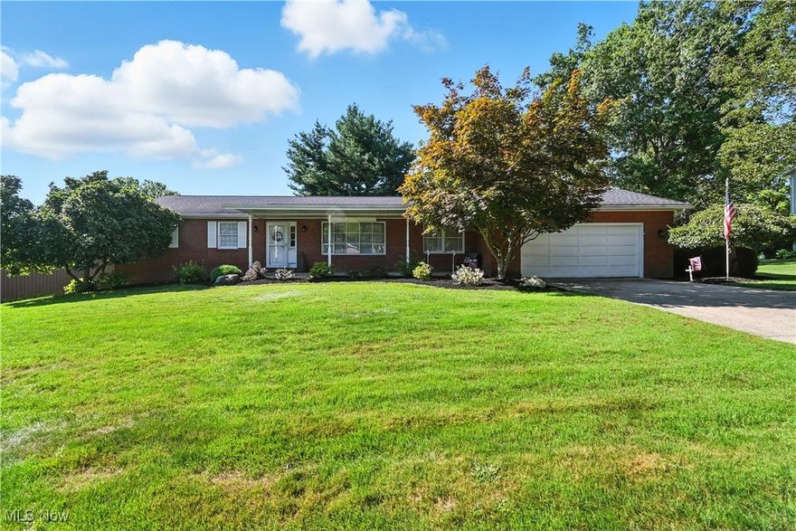 Welcome to this inviting 3-bedroom, 2-bath home in the Wooster City School District. With 1,830 sq ft of living space, it has been lovingly maintained and updated with refreshed landscaping that enhances curb appeal. Inside, the open-concept kitchen and living room feature mission-style cabinets, an eat-in kitchen, and a cozy gas log fireplace. Main floor laundry adds convenience, while the lower level offers a rec room perfect for a mancave, game room, or additional living space, along with a dedicated shop for hobbies or projects. Outdoors, enjoy a private yard with both a covered back patio and a covered front porch, ideal for relaxing or entertaining year-round. A full basement and 2-car garage provide plenty of storage and functionality. Built in 1973, this home blends timeless charm with thoughtful updates, making it truly move-in ready.
