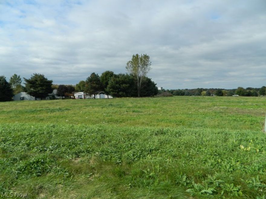 Large country lot ideally situated in Wooster's north end community of Sand Stone Ridge.  This well planned development is conveniently located close to I-71, shopping, schools and restaurants.  The lot offers underground utilities, natural gas, and is well and septic approved.  Deed restrictions on file.