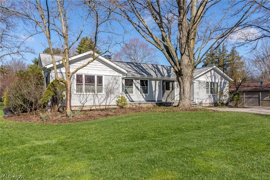 Imagine . . . Custom Everything! This expanded, remodeled home has the finest of finishes from granite, porcelain, glass, marble, and hardwoods. Custom Front porch invites you in to find an open floor plan. Maple flooring throughout! The expansive living room featuring a porcelain wood burning fireplace wall. Dining area is part of the Truly Gourmet Kitchen! All high end appliances including 2 dishwashers, 6 burner viking stove are surrounded by custom cabinetry. Fabulous center island has extra seating. Built in pantry and desk are an extra! Granite laundry room offers extra storage and sink. First floor master suite offers large walk in closet and elegant custom glamour bath with walk in shower and sunken soaking tub. The glasswork and cabinetry are impeccable! Split ranch layout offers two bedroom with glamour bath! Lower level provides secondary living space, custom full bath, office area and hobby rooms. All this nestled on half acre lot with great garden areas! Addition '07, Ande