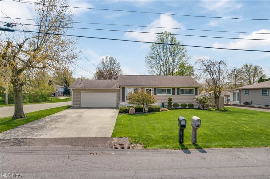 The pride of ownership shows in this updated Massillon ranch! As you enter through the front door, you are instantly greeted with natural lighting, hardwood floors and tasteful design. The kitchen is open to both the dining and living areas for convenience, with back door leading to the private deck with sprawling fenced in backyard; the perfect place to unwind and relax! All three bedrooms are on the main level and share an updated full bathroom, complete with custom tile shower and newer vanity. The basement provides additional finished sq footage with a spacious rec room area, second full bathroom with tiled shower, along with laundry area and plenty of space for storage. You will appreciate the two car attached garage and cement driveway. Furnace and A/C both installed 2022. Situated in Massillon schools or take advantage of Tuslaw open enrollment as the bus comes right by the house! Whether moving up or down, this is a property you will feel proud to call home! Schedule your showi